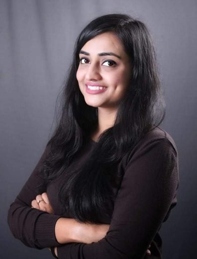 Portrait of Ayushi Gupta, product designer and design leader